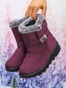 Warm purple waterproof snow boots featuring gray faux fur lining and adjustable velcro strap