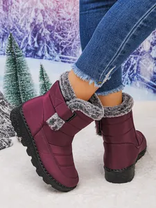 Warm purple waterproof snow boots for women with fur lining and Velcro closure