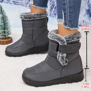 Detailed view of gray waterproof snow boots showing shaft and heel dimensions