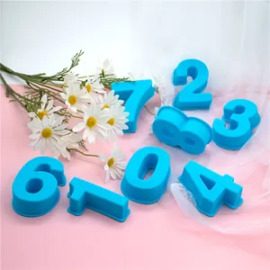 Detailed macro view of professional blue silicone number cake molds with floral accents