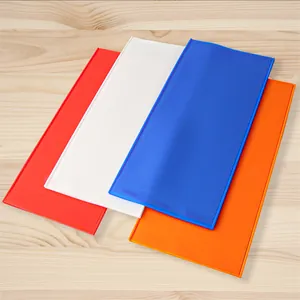 Detailed view of the colorful silicone beehive foundation molds on a light wood surface
