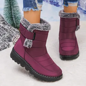 Purple waterproof women's snow boots with warm faux fur lining and velcro strap