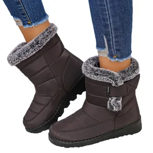Women's warm brown waterproof snow boots featuring faux fur collar and velcro straps