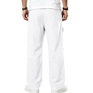 Vue arrière du pantalon de jogging blanc épais à jambes larges pour homme style hip-hop