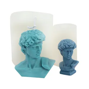 Macro view showing large David bust silicone molds and matching DIY scented candles