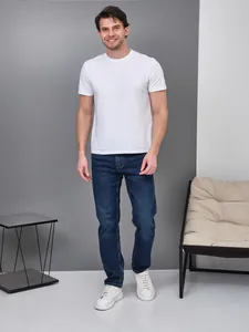 Full-body view of slim fit straight-leg men's jeans in dark blue wash for casual wear