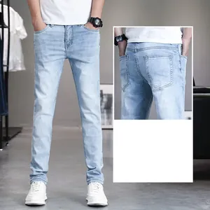 Close-up detail of light blue slim-fit stretch denim jeans for men's casual wear