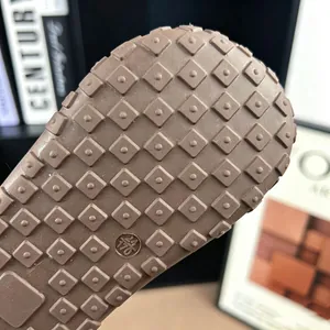 Macro view of non-slip waffle pattern rubber sole on children's casual sports shoes