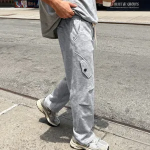 Close-up of gray American style heavy weight cargo sweatpants with curved seams