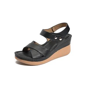 Casual women's black platform wedge sandals with decorative metal buckle and cross straps
