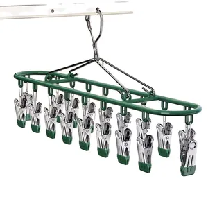 Stendibiancheria durevole in acciaio inox verde con 20 clip per calzini e biancheria intima.