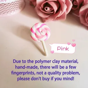 Detailed view of handmade pink polymer clay lollipop brooch for bags or clothes