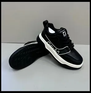 Men's premium black leather sneakers featuring a thick white sole and detailed tread pattern