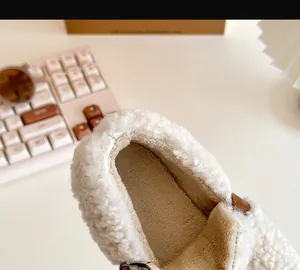 Close-up view of the soft and warm sheep wool lining inside infant winter cotton shoes