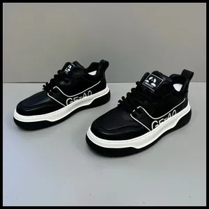 Premium men's black and white leather sneakers with a chunky sole for casual wear