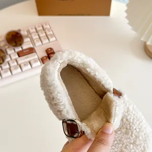 Cozy fleece baby winter walking shoes with warm lining and soft brown adjustable strap