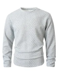 Close-up detail of a grey long-sleeved crew neck sweatshirt featuring a textured diamond pattern