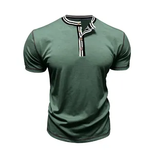 Close-up of men's short-sleeved sage green Henley shirt with striped collar details