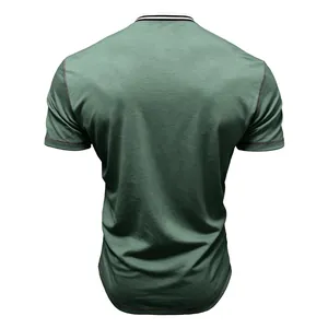 Back view of men's green short-sleeve T-shirt featuring contrast stitching and striped collar.