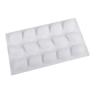 Top-down detailed view of a flexible white 15-cavity lemon-shaped silicone baking mold.