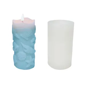 Close-up of ocean-themed silicone candle mold with seashell and starfish patterns