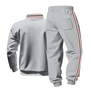 Detailed back view of men's gray heavyweight tracksuit with striped side tape accents.