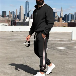 Detail view of men's black tracksuit with stylish side stripe and stand collar