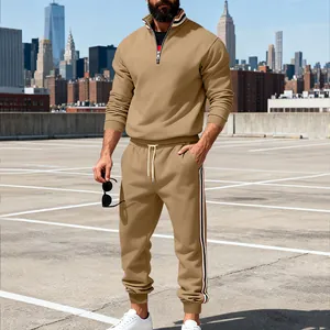 Detailed view of khaki men's heavy tracksuit with contrasting striped webbing