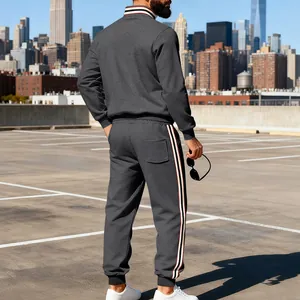 Detailed back view of men's premium heavy grey tracksuit with red and white striped side tape