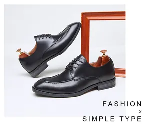 Classic black men's lace-up Derby shoes with leather texture shown from a side detail angle