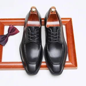 Vintage black men's leather Derby shoes featuring a square toe and classic lace-up design
