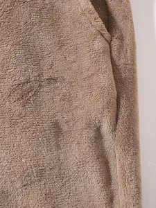 Detailed view of soft brown fleece fabric texture for men's thermal straight pants detail