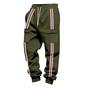 Detail of olive cargo sweatpants with distinctive striped side bands and pockets.