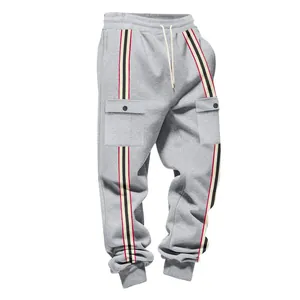 Detailed view of grey fleece cargo sweatpants featuring vintage striped webbing design.