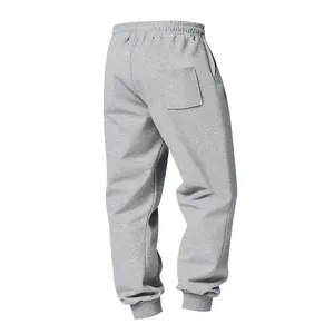 Detail view of back pocket and ribbed cuffs on men's heavy-weight grey fleece joggers