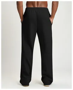 Detailed back view of men's loose fit wide-leg black sports trousers for casual wear