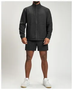 Full body view of men's athletic zip-up jacket and shorts set in charcoal heather grey.