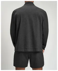 Rear view of men's dark grey textured knit athletic jacket for outdoor sports