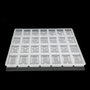 Detailed view of a translucent silicone domino mold for DIY resin crafts and fondant