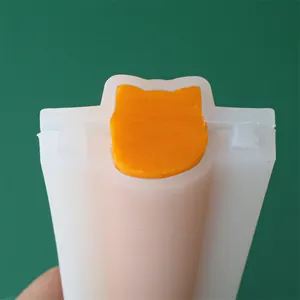 Detailed view of cat-head shaped silicone tube mold for DIY soap and mousse cakes
