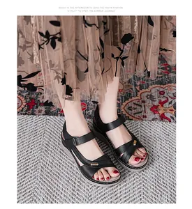 Side view of comfortable black platform sandals for women with stylish metallic buckle