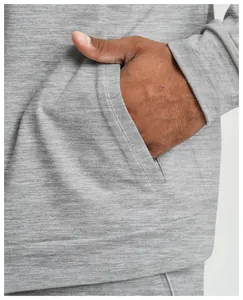 Detail view of heather gray knit sports jacket showing pocket and soft texture