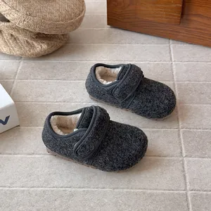 Cozy grey wool children's shoes featuring warm fleece lining and secure Velcro strap