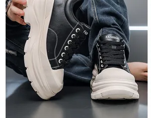 Close-up of men's 10cm chunky platform shoes with black leather upper and beige sole