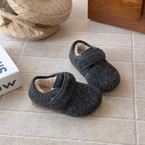 Cozy grey wool kids winter shoes with warm faux fur lining and soft non-slip soles.