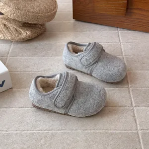 Detailed view of grey wool children's winter shoes featuring a soft warm lining