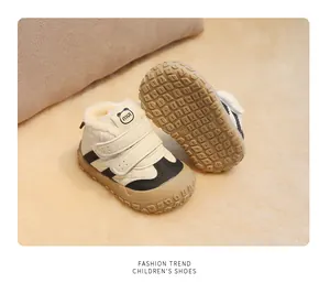 Detailed view of warm fleece lining and non-slip sole on toddler winter shoes