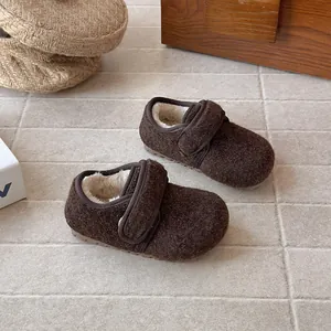 Cozy dark brown wool children's loafers with soft warm fur lining and Velcro strap