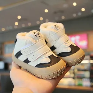 Warm winter toddler boots with thick fleece lining and non-slip soft soles for babies.