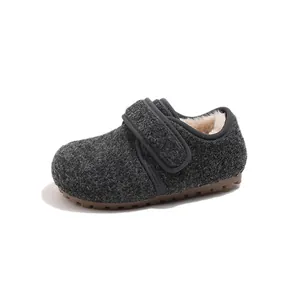 Cozy children's winter wool felt shoes with warm fleece lining and soft rubber sole.